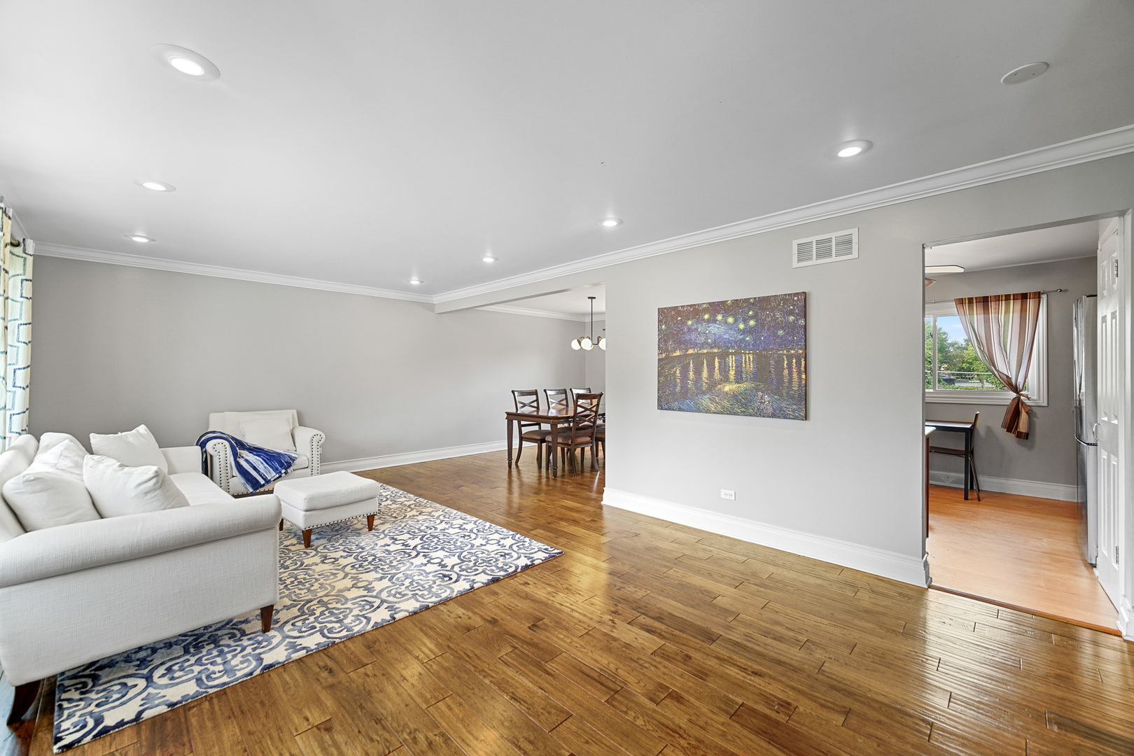 1S550 Nimitz Road Oakbrook Terrace, IL 60181 - Photo 7 of 23 a living room with furniture and wooden floor