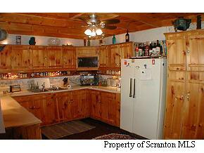 6 Indian Spring Road Tunkhannock, PA 18657 - Photo 2 of 7 a kitchen view with cabinets