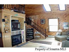 6 Indian Spring Road Tunkhannock, PA 18657 - Photo 7 of 7 a view of entryway livingroom and hall with wooden floor