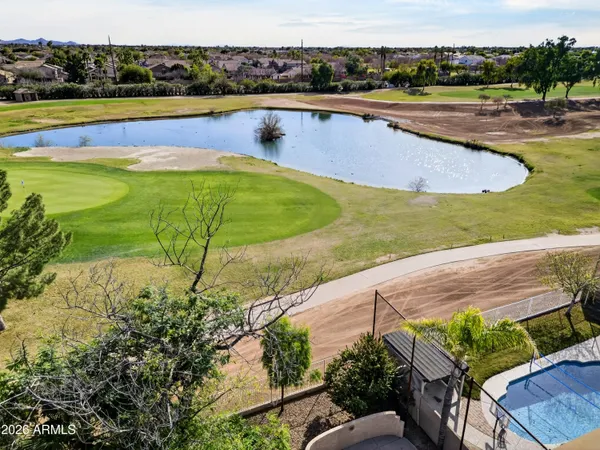 a view of a swimming pool and an outdoor space