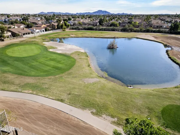 a view of a swimming pool and lake