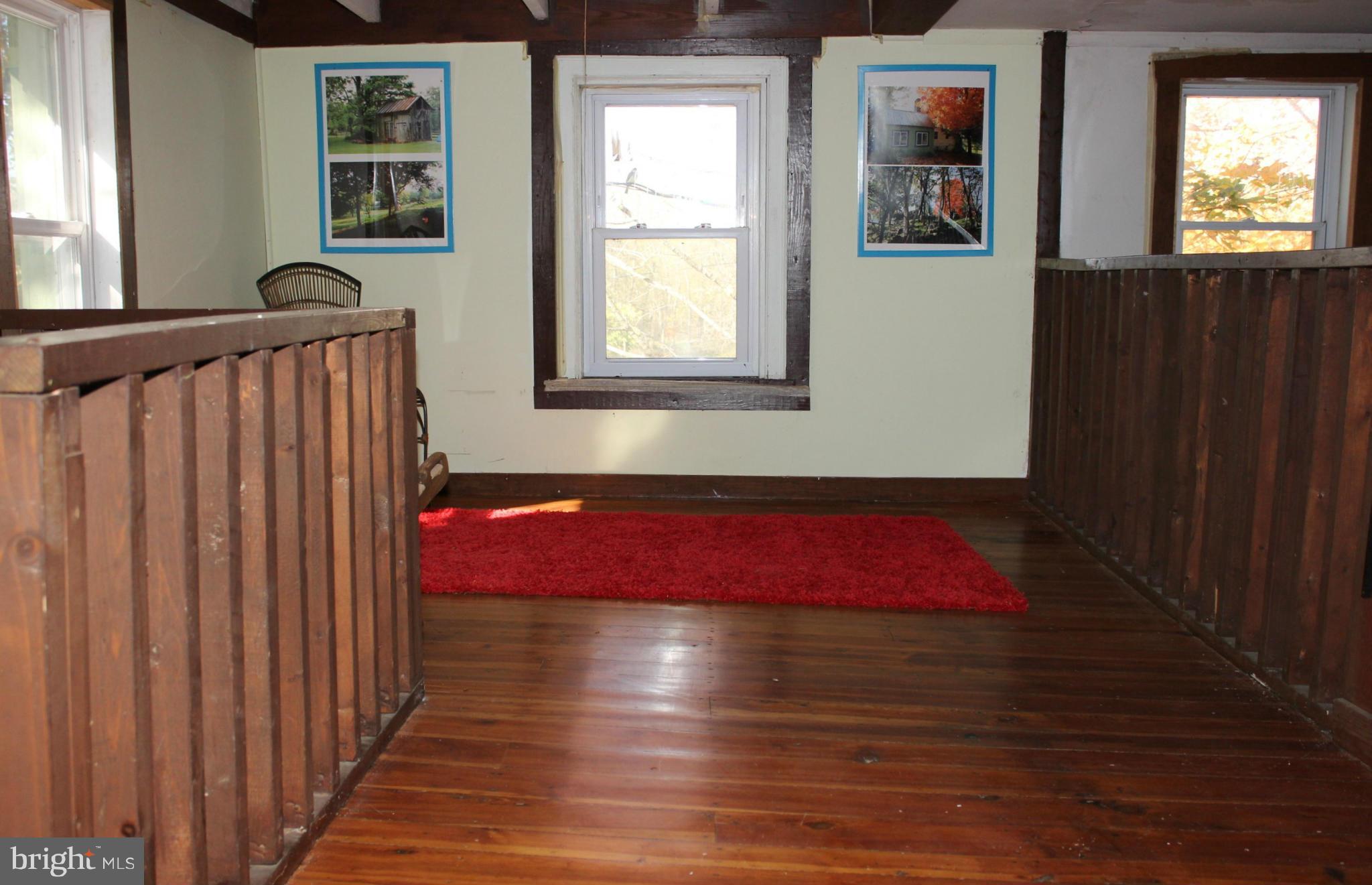 2154 Leetown Road Summit Point, WV 25446 - Photo 14 of 29 Upper Level Loft Area overlooks Family Room