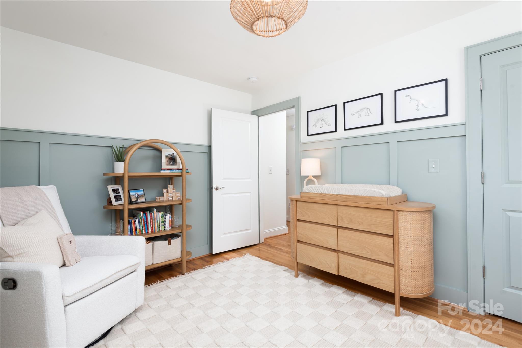 665 Marsh Road Charlotte, NC 28209 - Photo 14 of 31 a room that has a bed and a book shelf in it