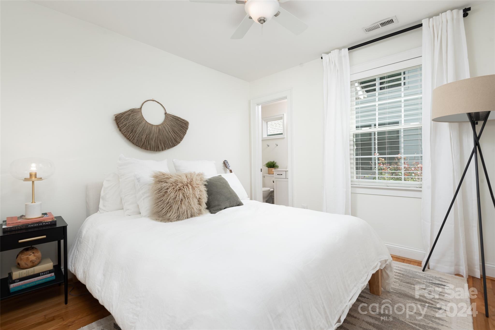 665 Marsh Road Charlotte, NC 28209 - Photo 17 of 31 a bedroom with a bed and a window