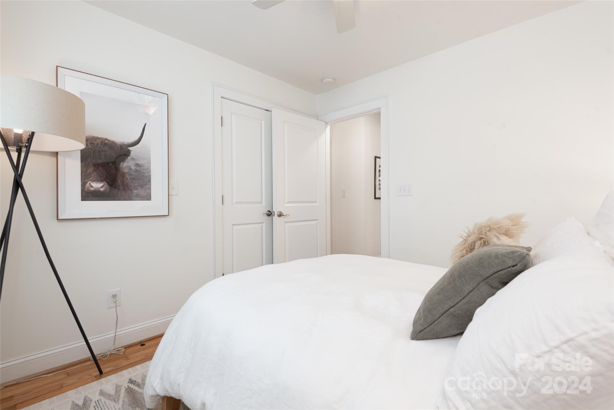 665 Marsh Road Charlotte, NC 28209 - Photo 18 of 31 a spacious bedroom with a bed and a mirror