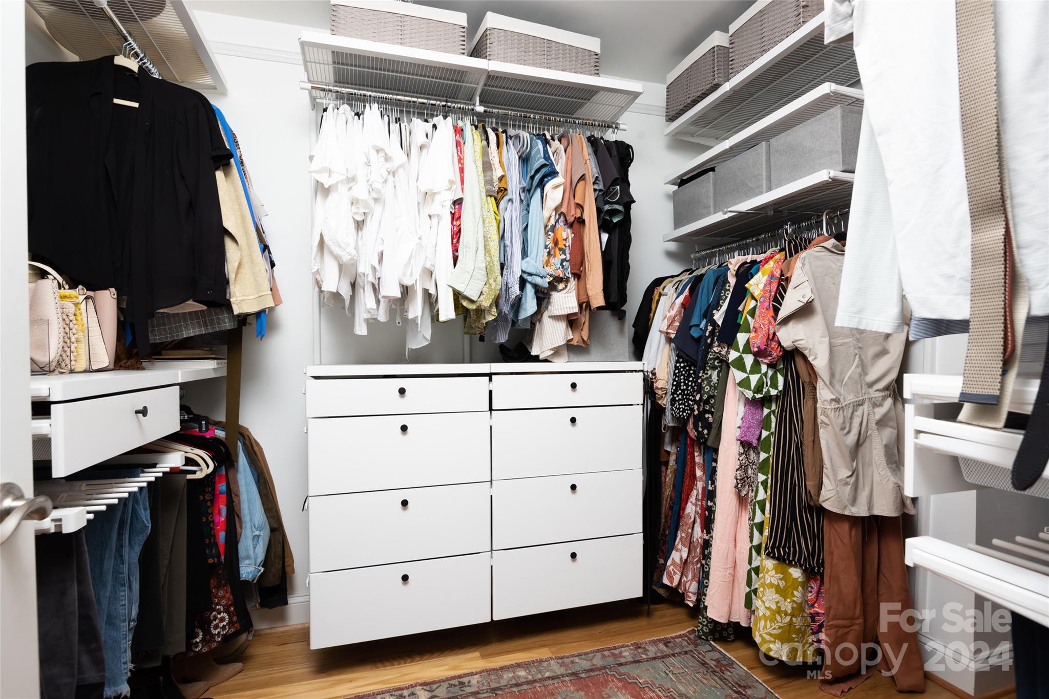 665 Marsh Road Charlotte, NC 28209 - Photo 23 of 31 a view of walk in closet with clothes and shoes