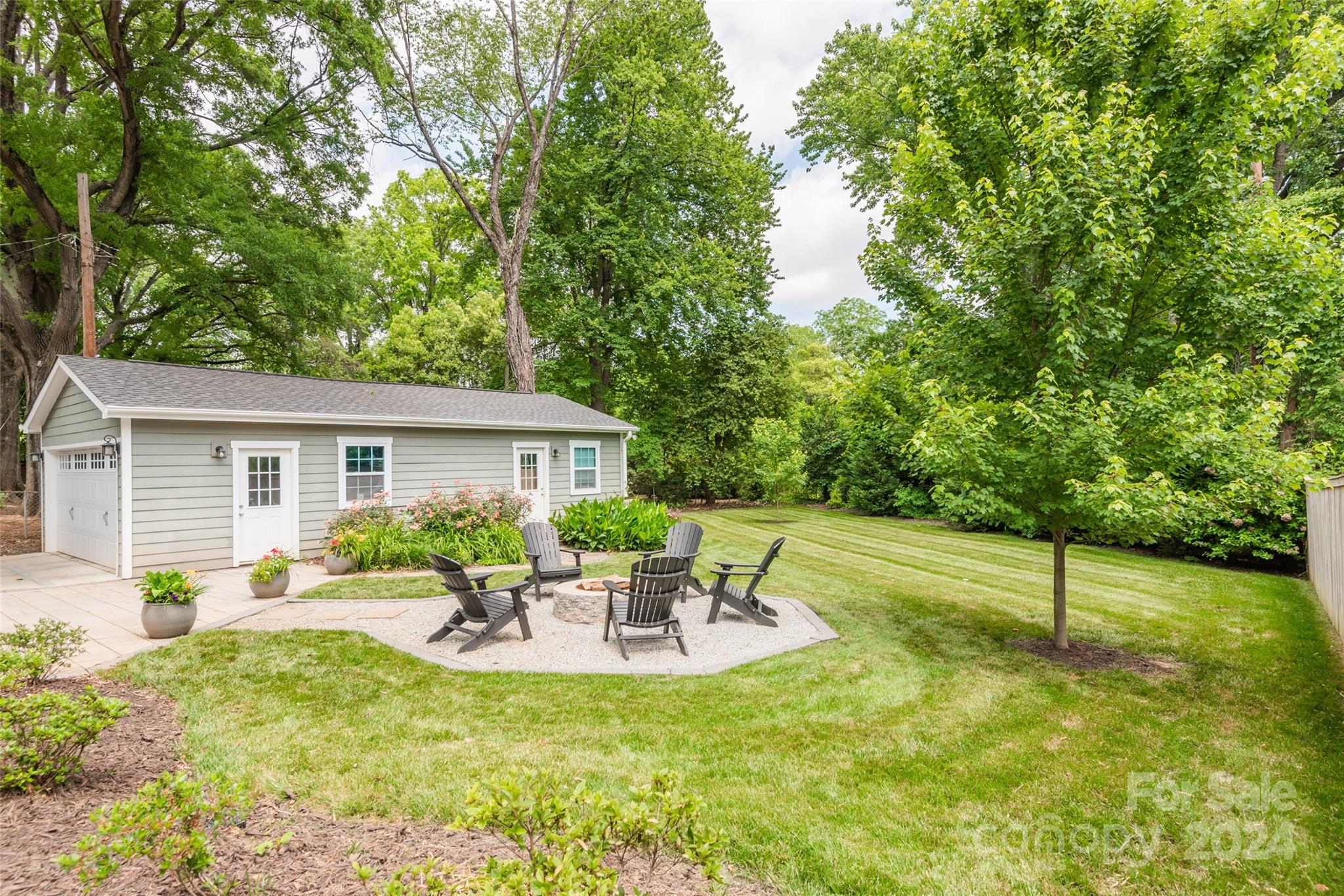 665 Marsh Road Charlotte, NC 28209 - Photo 27 of 31 a view of a house with backyard and sitting area