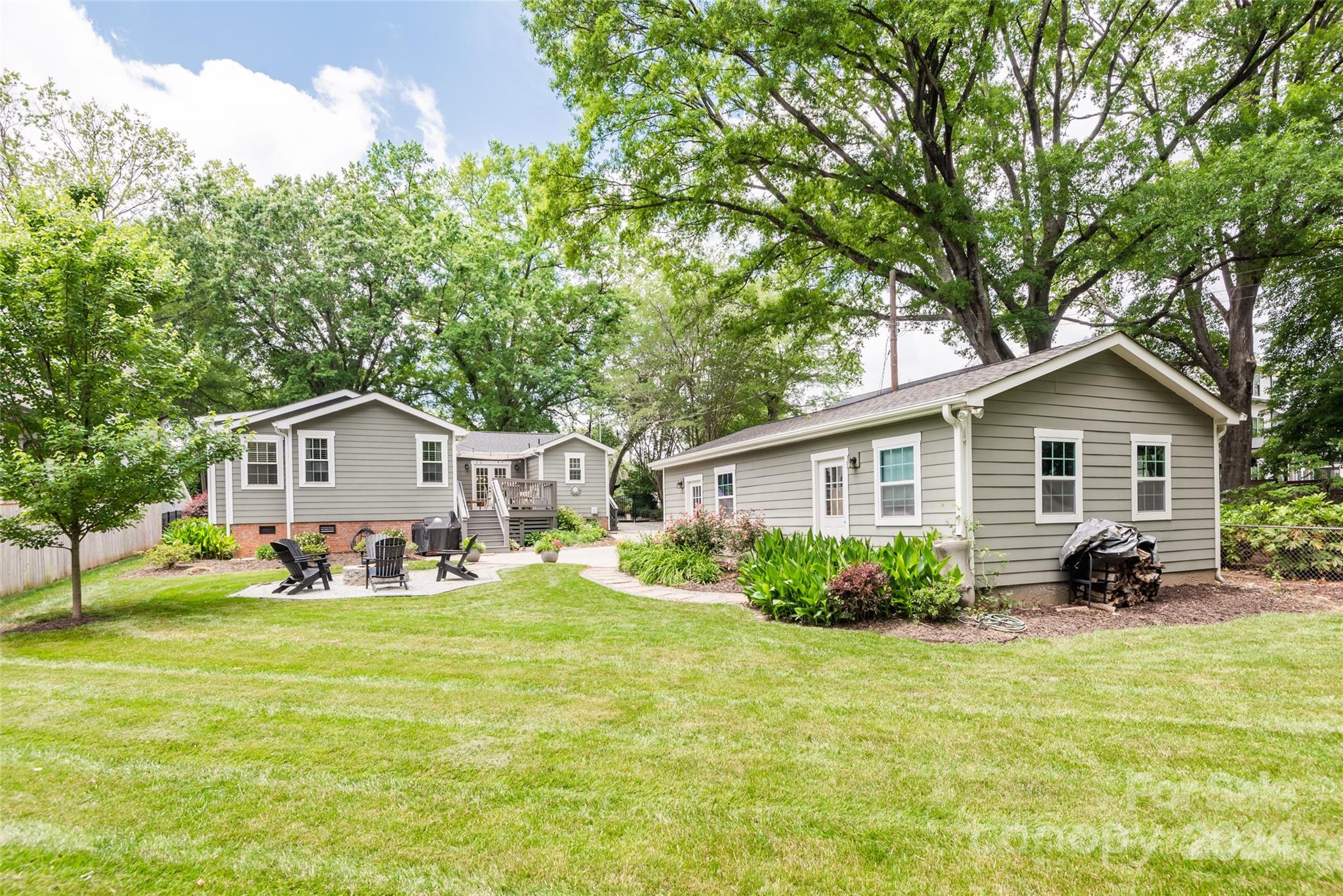 665 Marsh Road Charlotte, NC 28209 - Photo 29 of 31 a front view of a house with garden