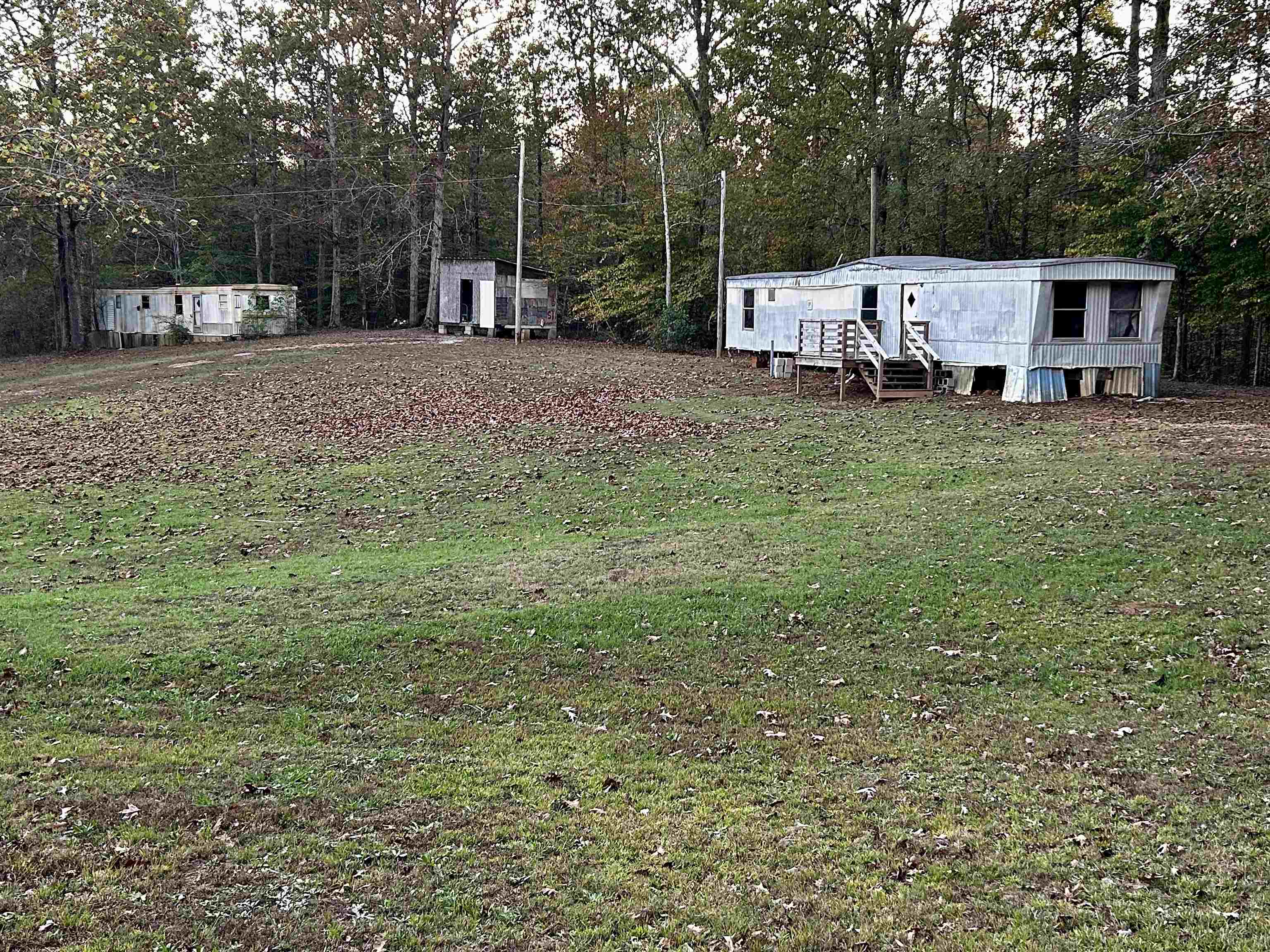 292 Shane Lane Ramer, TN 38367 - Photo 3 of 8 a view of a house with a backyard