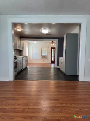 a view of balcony with floor to ceiling windows and outdoor view