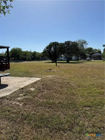 a view of an outdoor space and a yard