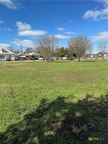 a view of an outdoor space and a yard