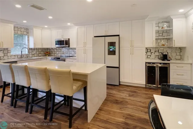 $410,000 | 9390 Southwest 61st Way, Unit D, Boca Raton, FL 33428