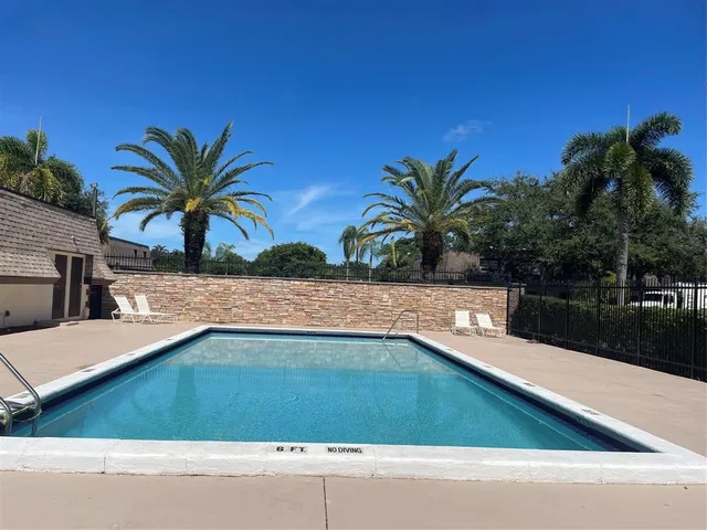 a front view of a house with garage