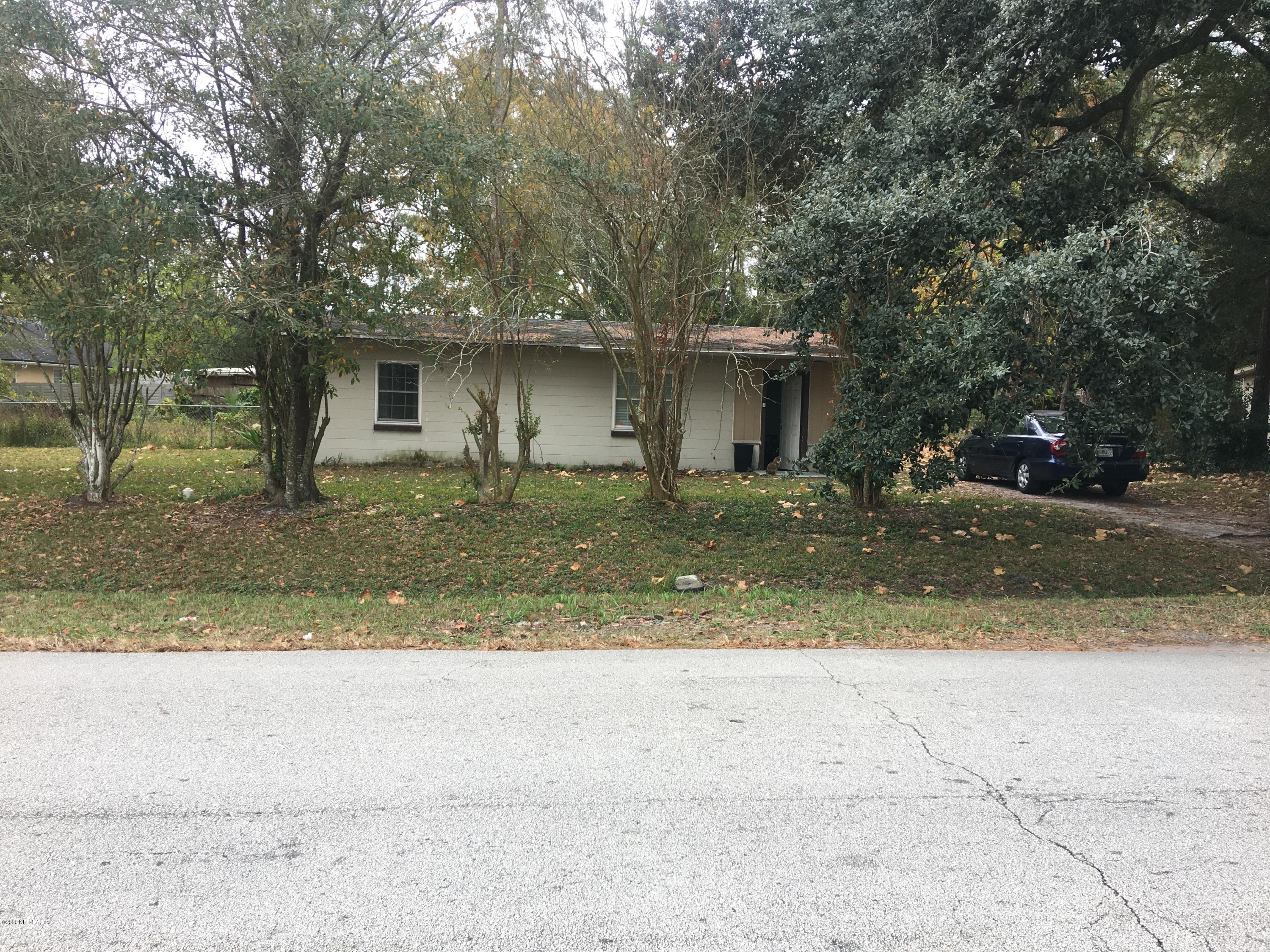 7222 Ridgeway Road North Jacksonville, FL 32244 - Photo 2 of 8 front view of a house with a yard
