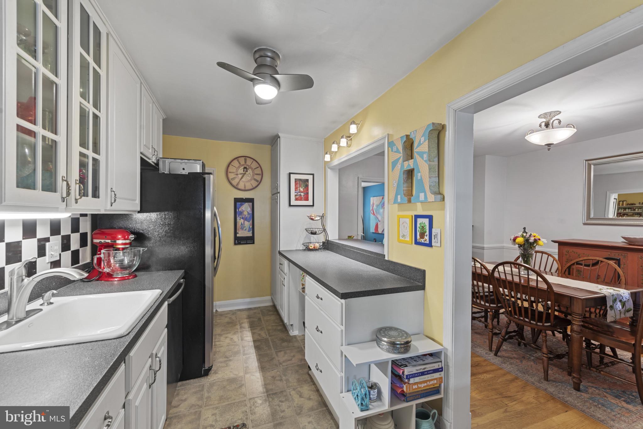 238 Gaywood Road Baltimore, MD 21212 - Photo 12 of 42 Seamless flow between kitchen & Dining