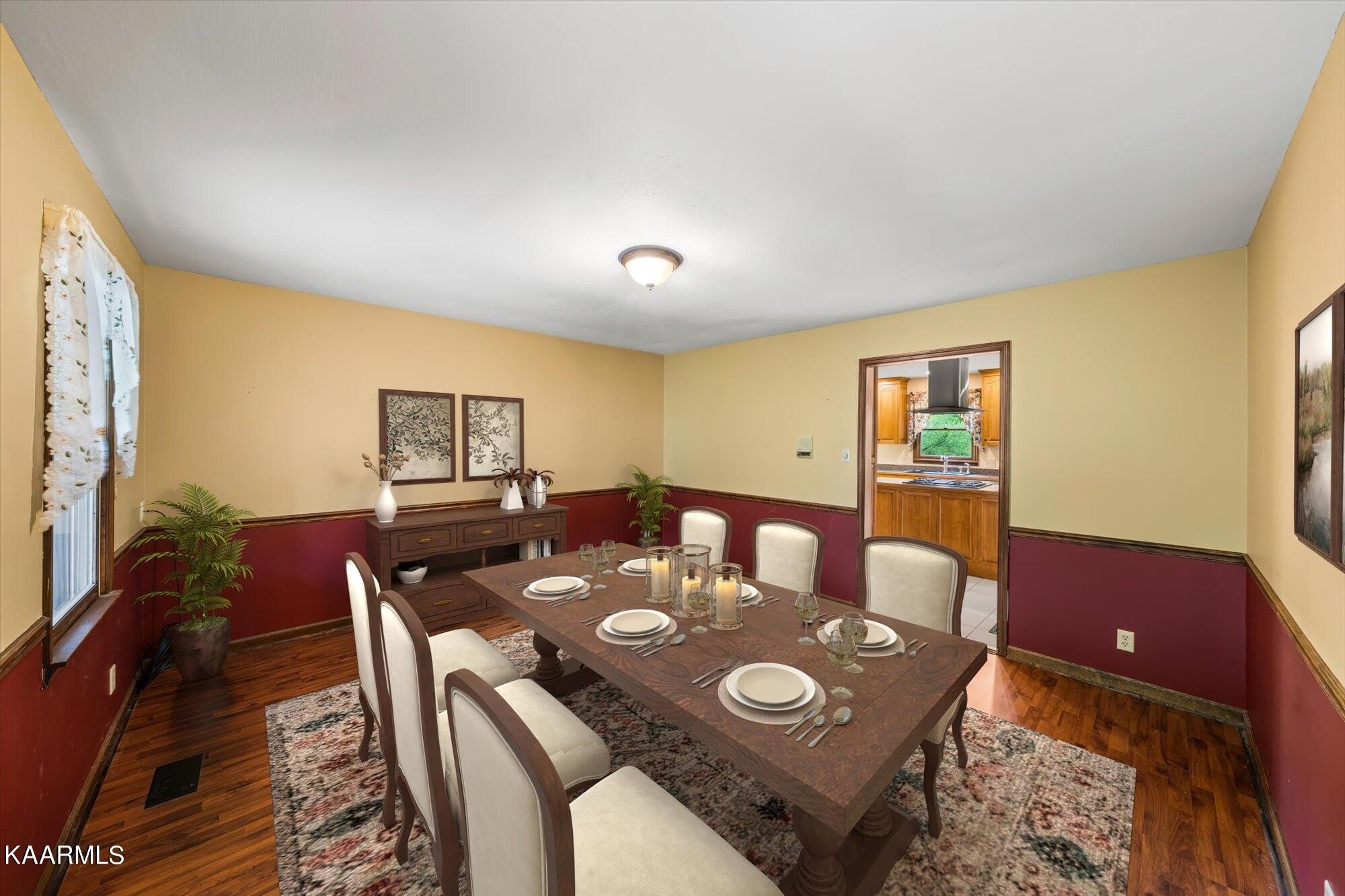 127 Chestnut Hill Road Oak Ridge, TN 37830 - Photo 15 of 45 a view of a dining room with furniture and wooden floor