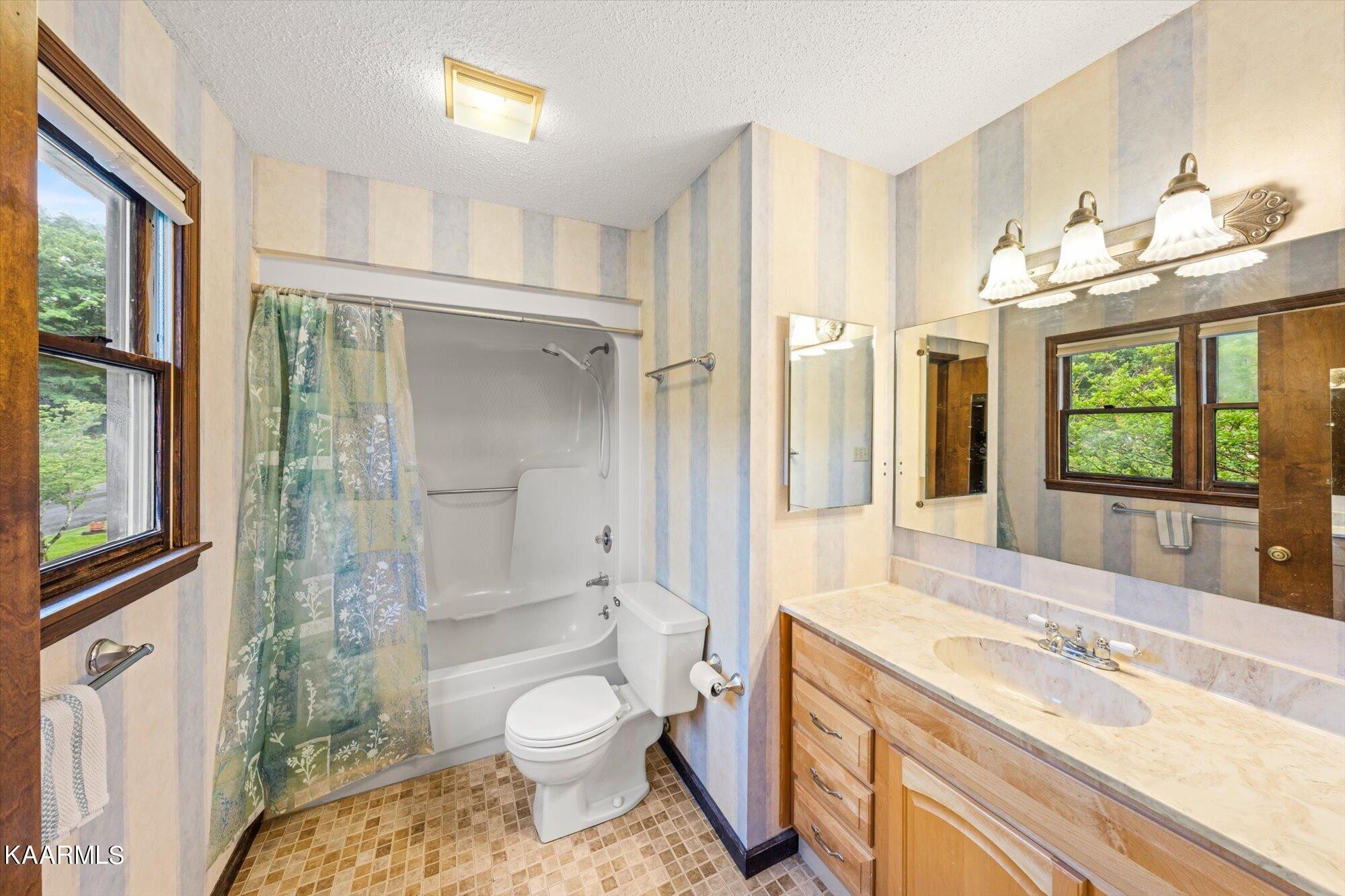 127 Chestnut Hill Road Oak Ridge, TN 37830 - Photo 22 of 45 a bathroom with a granite countertop sink toilet and shower