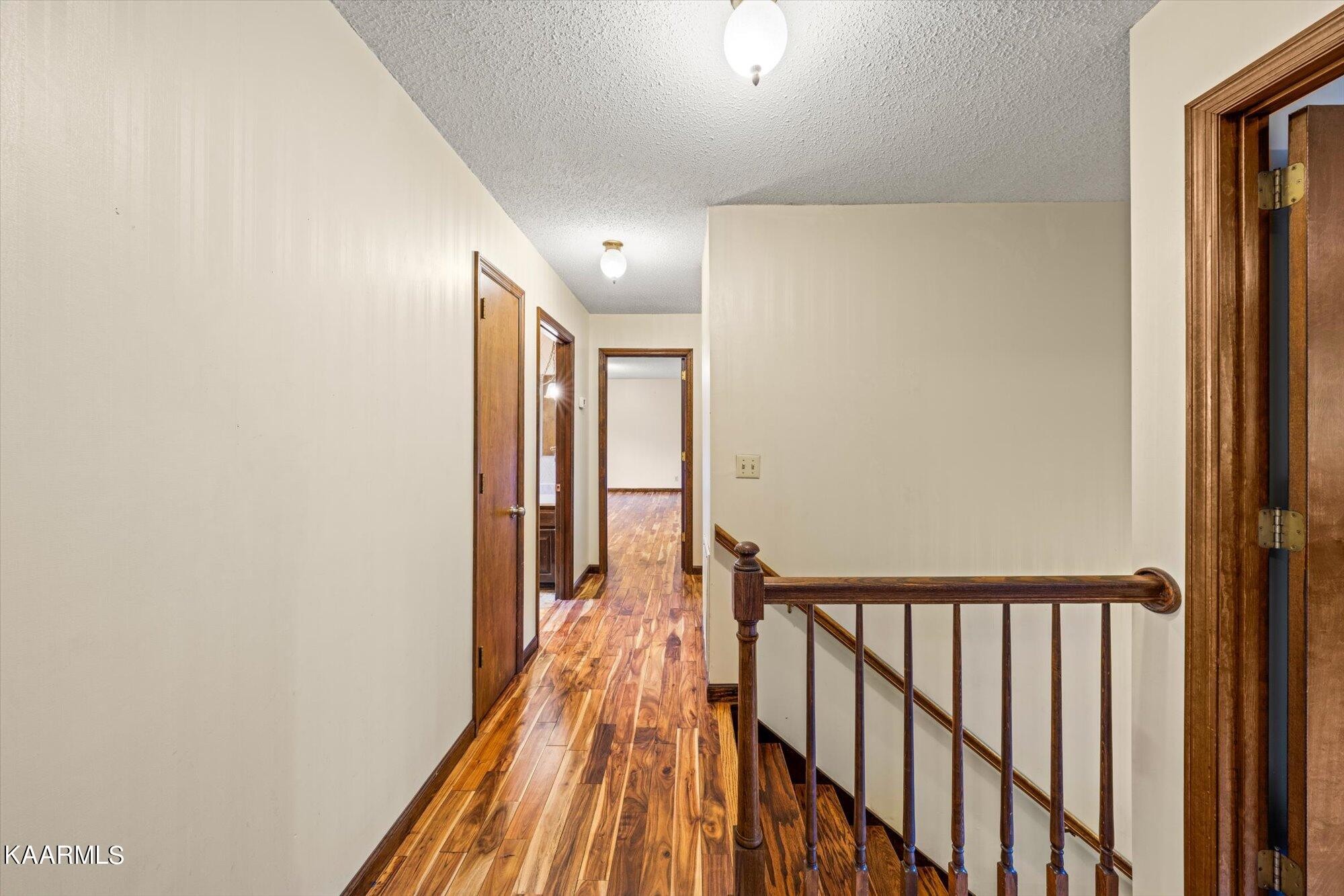 127 Chestnut Hill Road Oak Ridge, TN 37830 - Photo 27 of 45 a view of a hallway with wooden floor