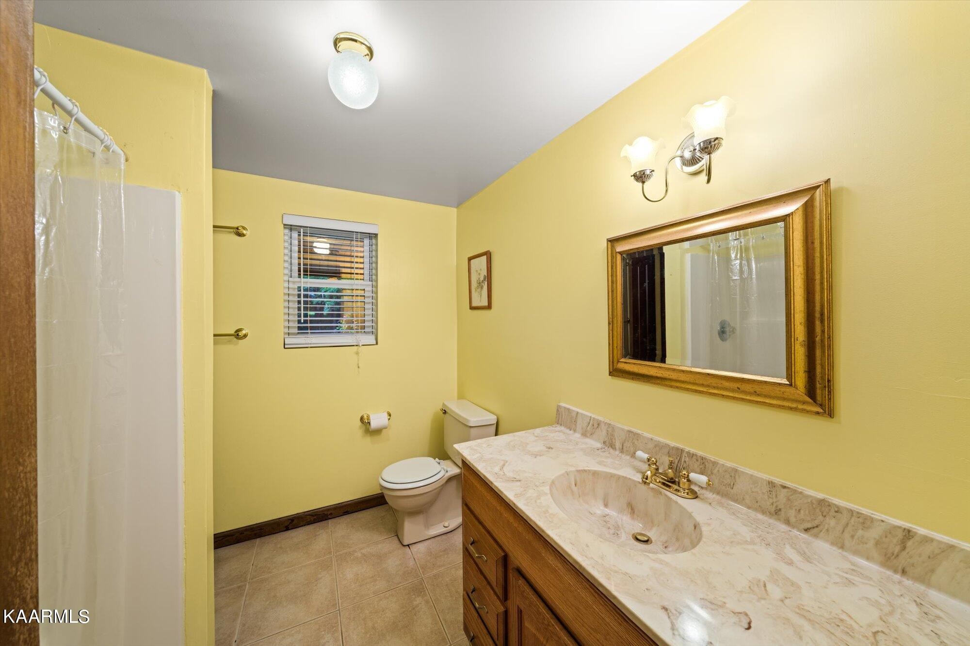 127 Chestnut Hill Road Oak Ridge, TN 37830 - Photo 31 of 45 a bathroom with a granite countertop sink toilet and shower
