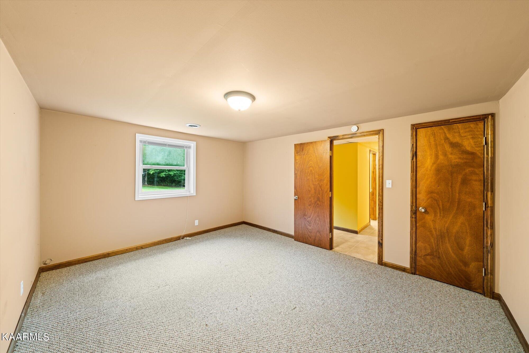 127 Chestnut Hill Road Oak Ridge, TN 37830 - Photo 32 of 45 a view of an empty room with a window