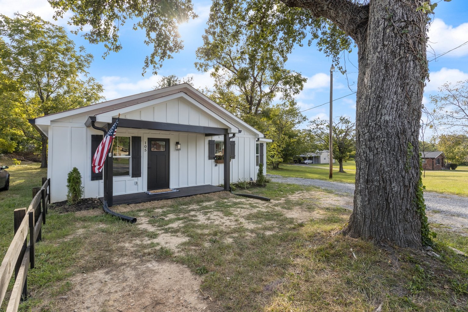 105 Pond Road Dickson, TN 37055 - Photo 1 of 13 a view of a house with a tree in front of a house