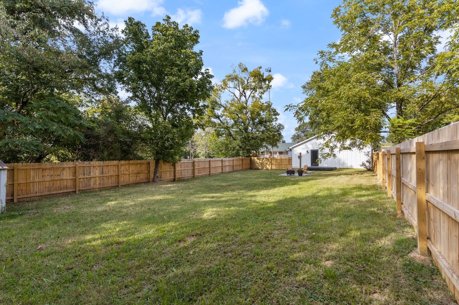 105 Pond Road Dickson, TN 37055 - Photo 11 of 13 a view of a yard with a house