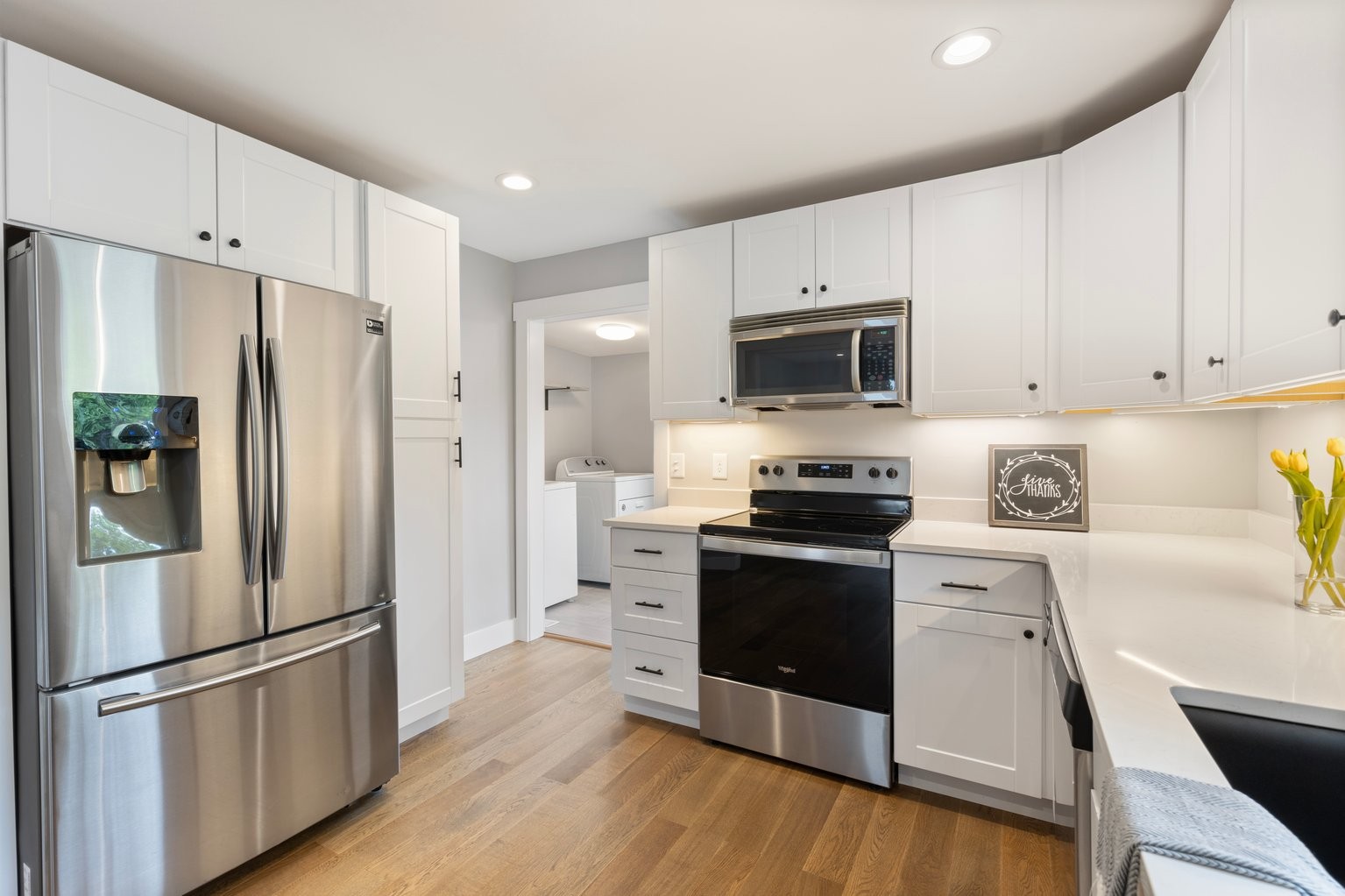 105 Pond Road Dickson, TN 37055 - Photo 4 of 13 a kitchen with stainless steel appliances a refrigerator sink and microwave