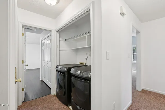 a kitchen with a stove and a refrigerator