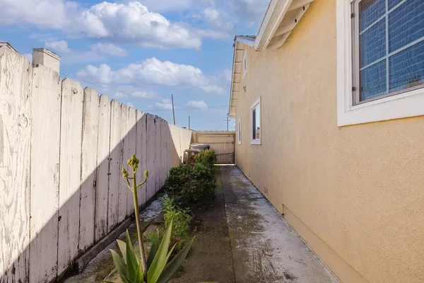 a view of a back yard of the house