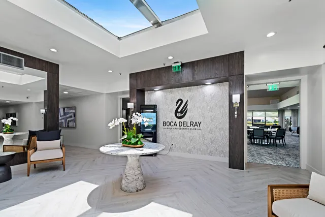 a view of a lobby with furniture and rug