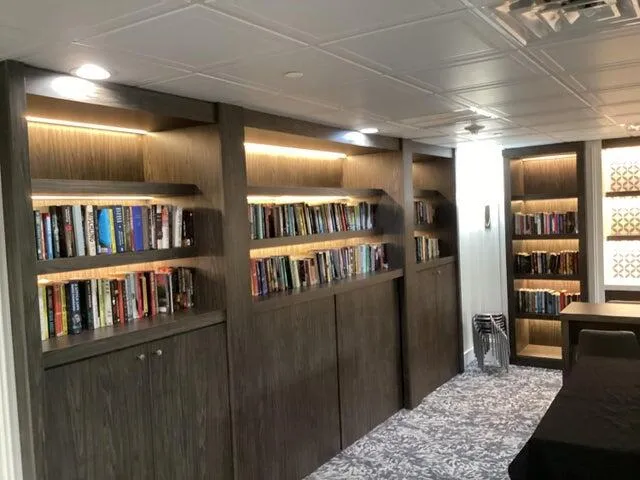 a view of entryway and hall with a couch