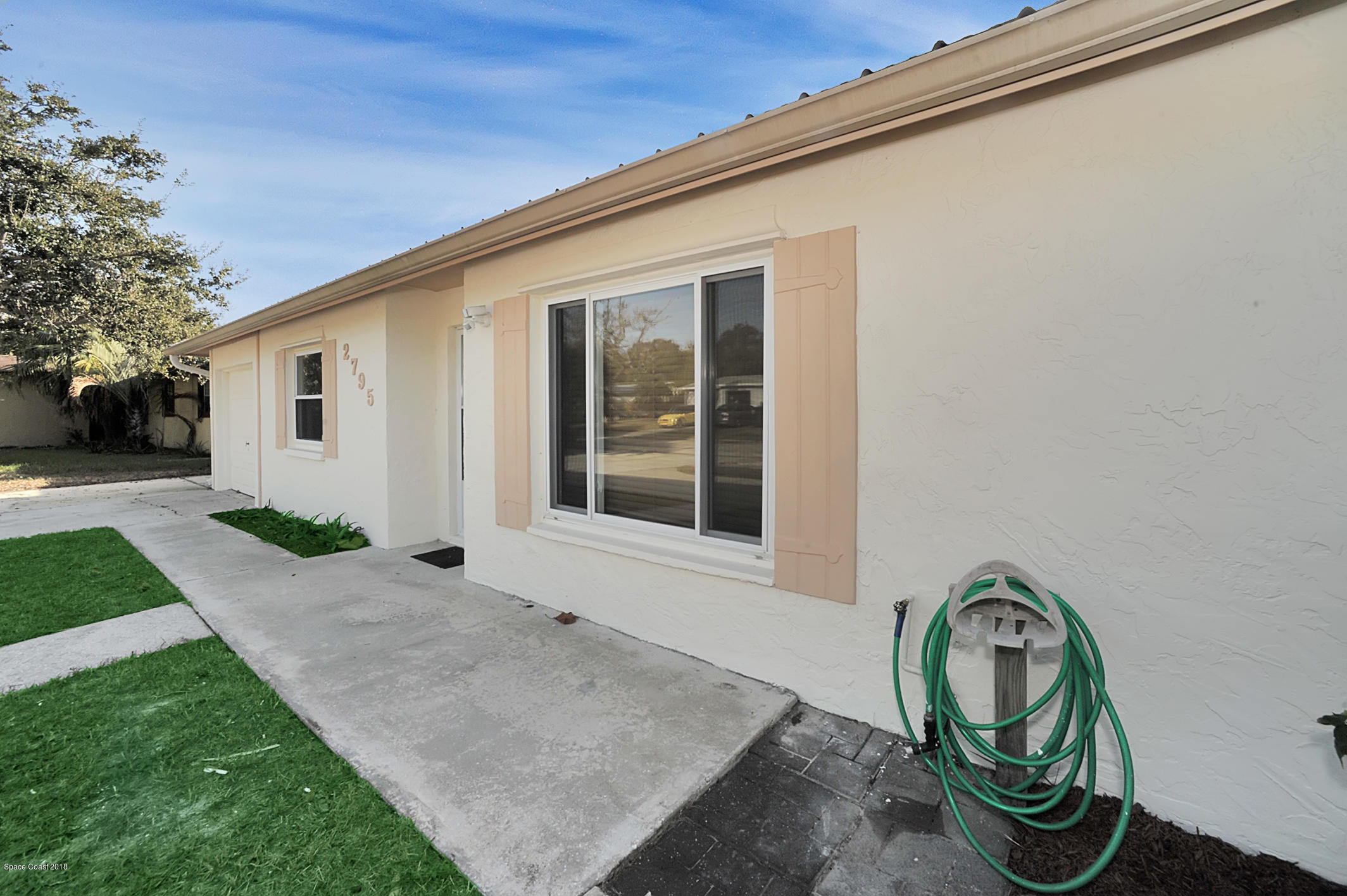 2795 Locksley Road Melbourne, FL 32935 - Photo 2 of 21 REW_7207