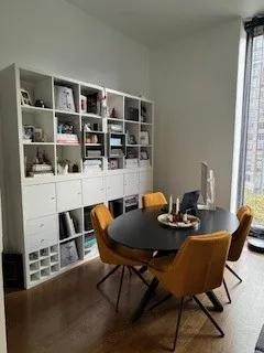 a table and chairs in a room