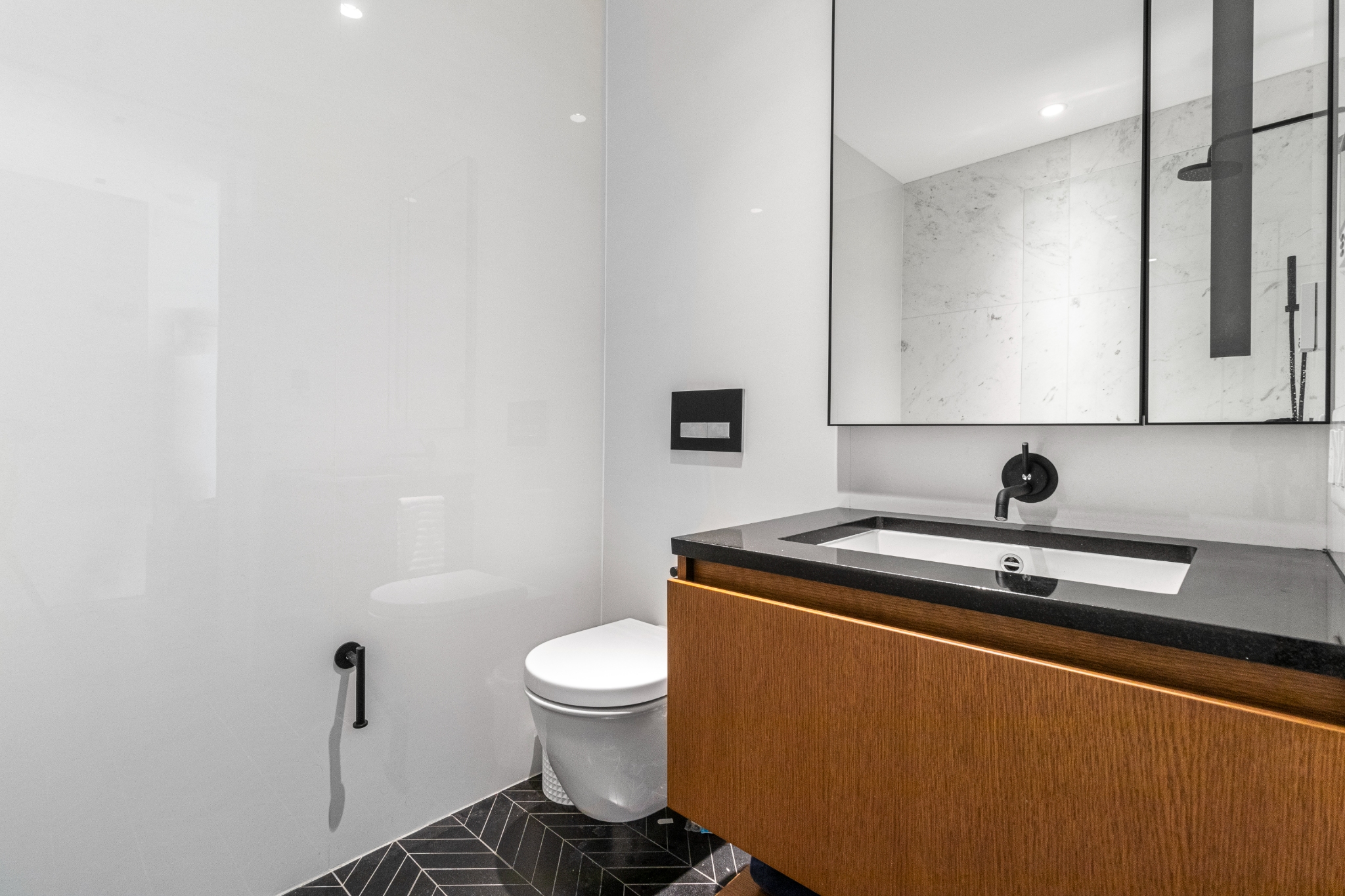 570 Broome Street, Unit 6B Manhattan, NY 10013 - Photo 7 of 9 a view of a room with wooden floor and sink