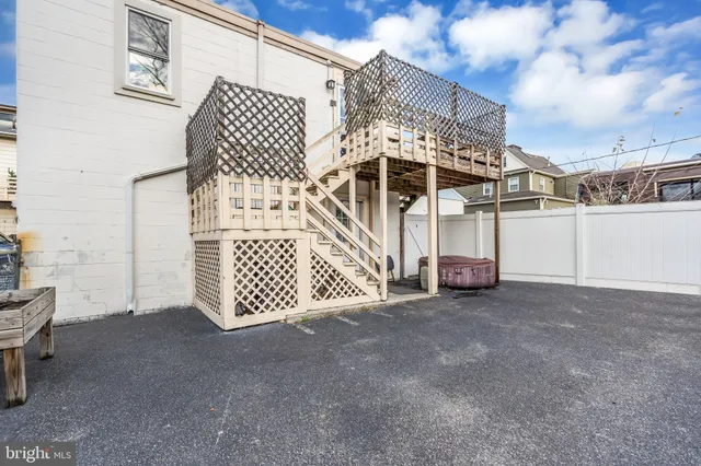 a view of a house with a gate