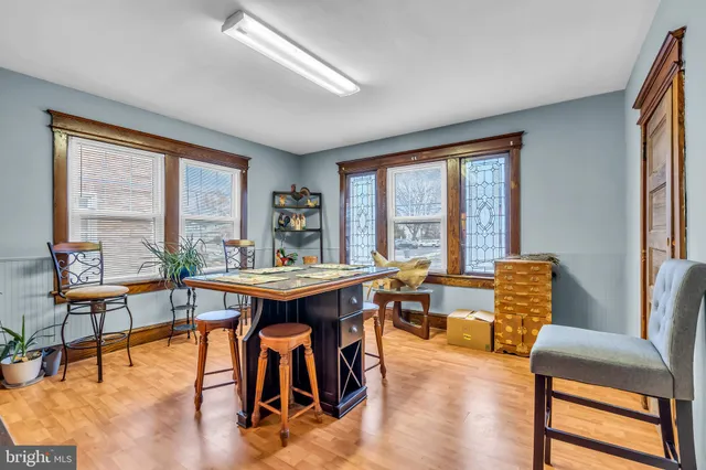 a view of a livingroom with furniture and a table