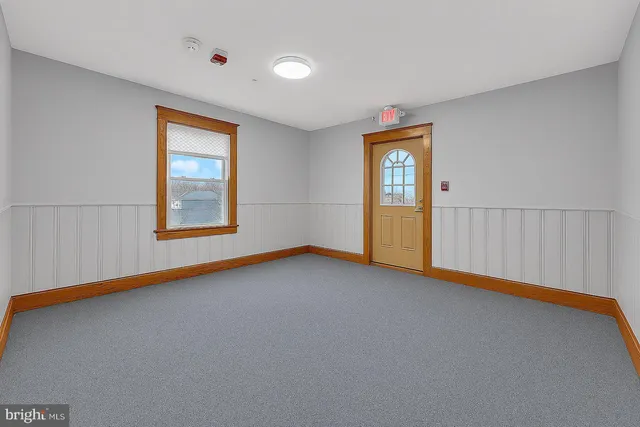 a bathroom with a sink vanity toilet and shower