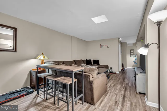 a living room with furniture and a couch