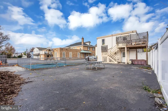 a view of a house with a street