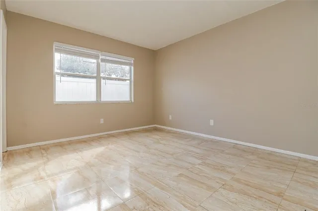 an empty room with a window