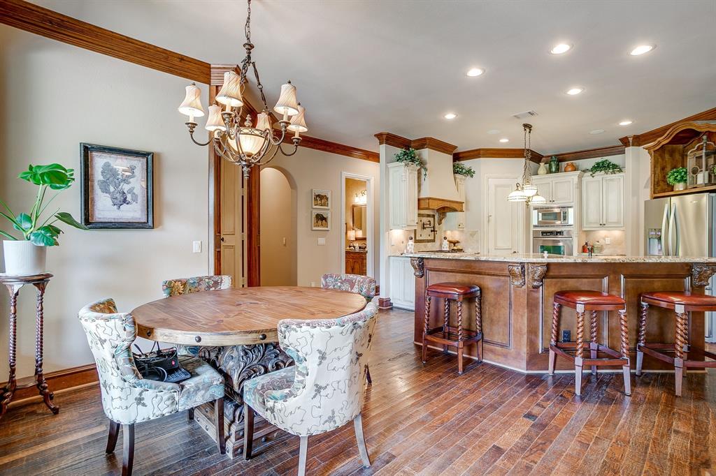 6251 Paper Shell Way Fort Worth, TX 76179 - Photo 13 of 40 a view of a dining room with furniture window and wooden floor
