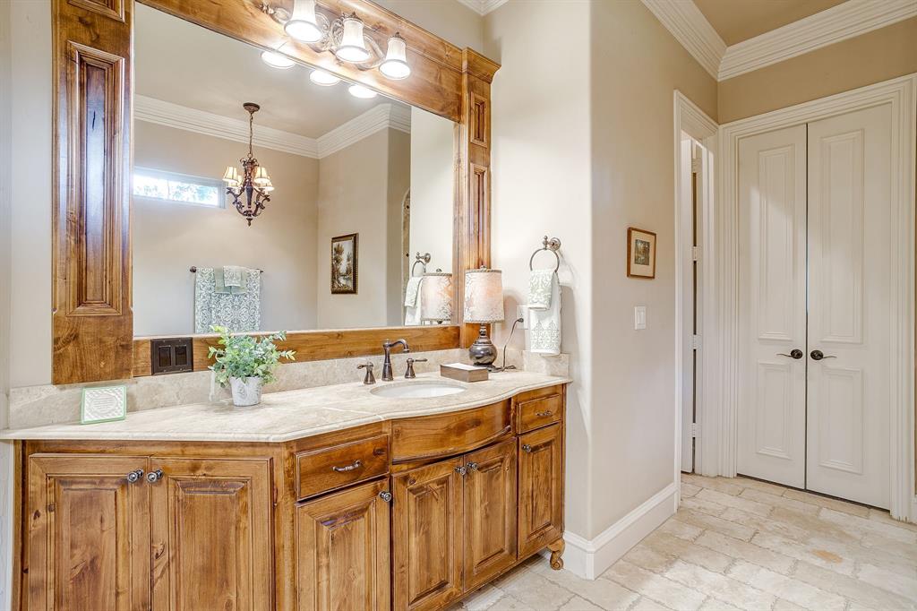 6251 Paper Shell Way Fort Worth, TX 76179 - Photo 17 of 40 a bathroom with a sink vanity and a mirror