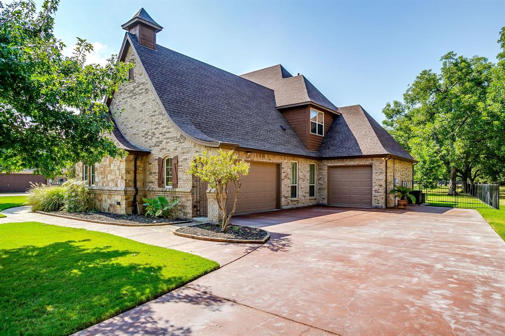 6251 Paper Shell Way Fort Worth, TX 76179 - Photo 2 of 40 a front view of a house with a yard