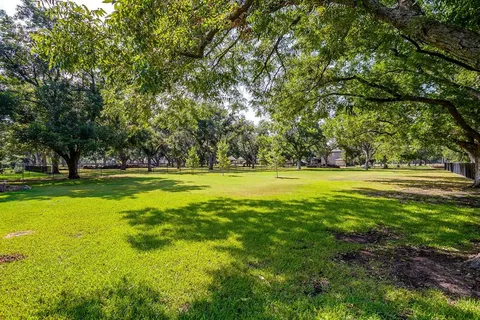 a view of outdoor space with deck and green space