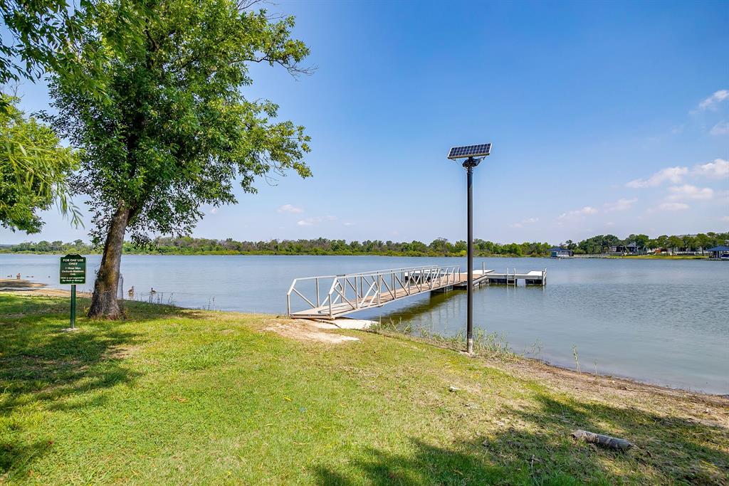 6251 Paper Shell Way Fort Worth, TX 76179 - Photo 39 of 40 a view of a lake with a large trees