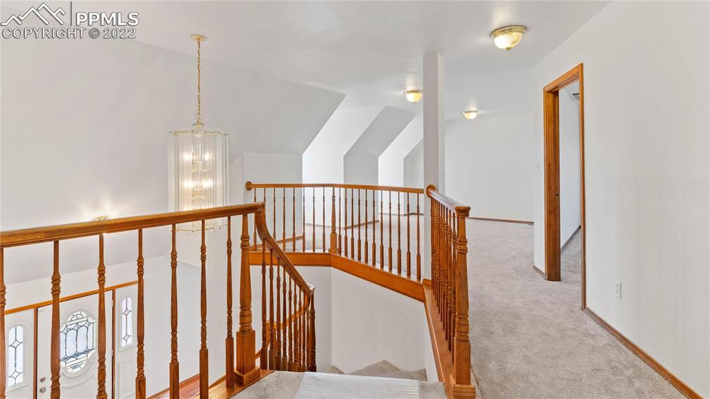 16250 Herring Road Colorado Springs, CO 80908 - Photo 23 of 50 a view of a hallway with windows