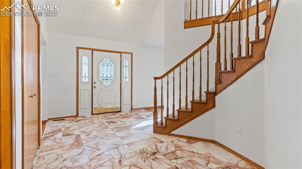 16250 Herring Road Colorado Springs, CO 80908 - Photo 3 of 50 a view of an entryway with staircase