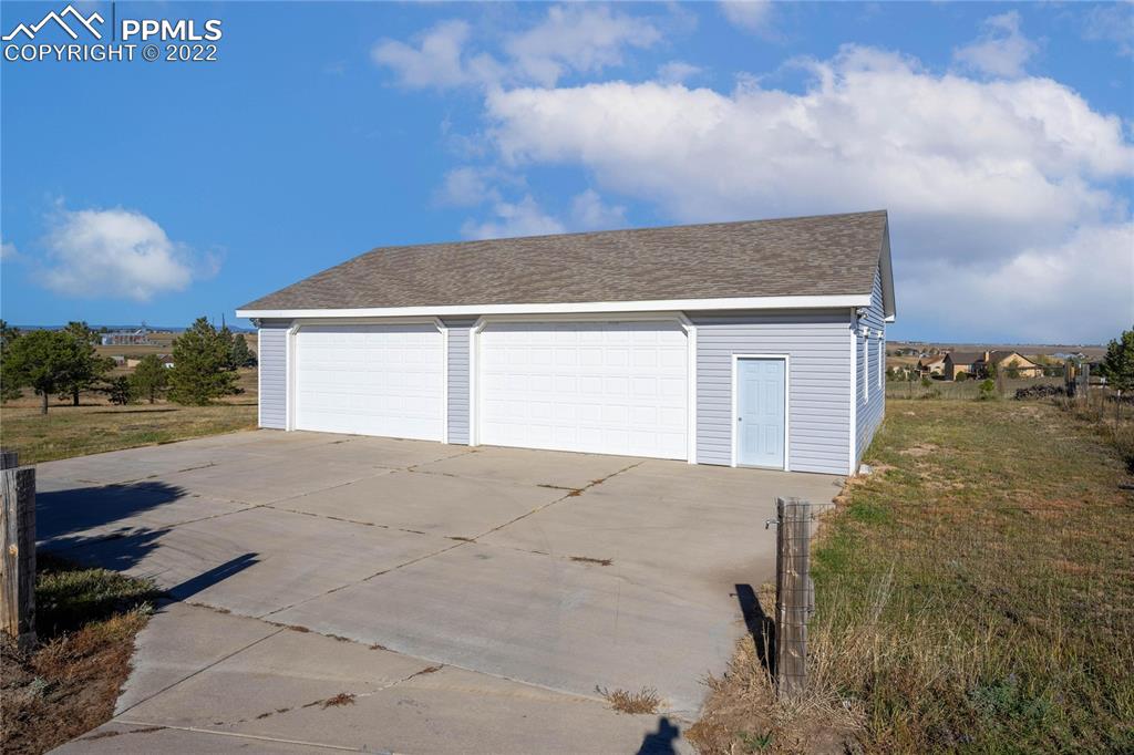 16250 Herring Road Colorado Springs, CO 80908 - Photo 44 of 50 a house with yard