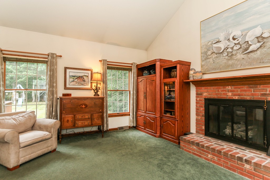 12 Bellows Road Wilbraham, MA 01095 - Photo 16 of 30 a living room with furniture and a fireplace